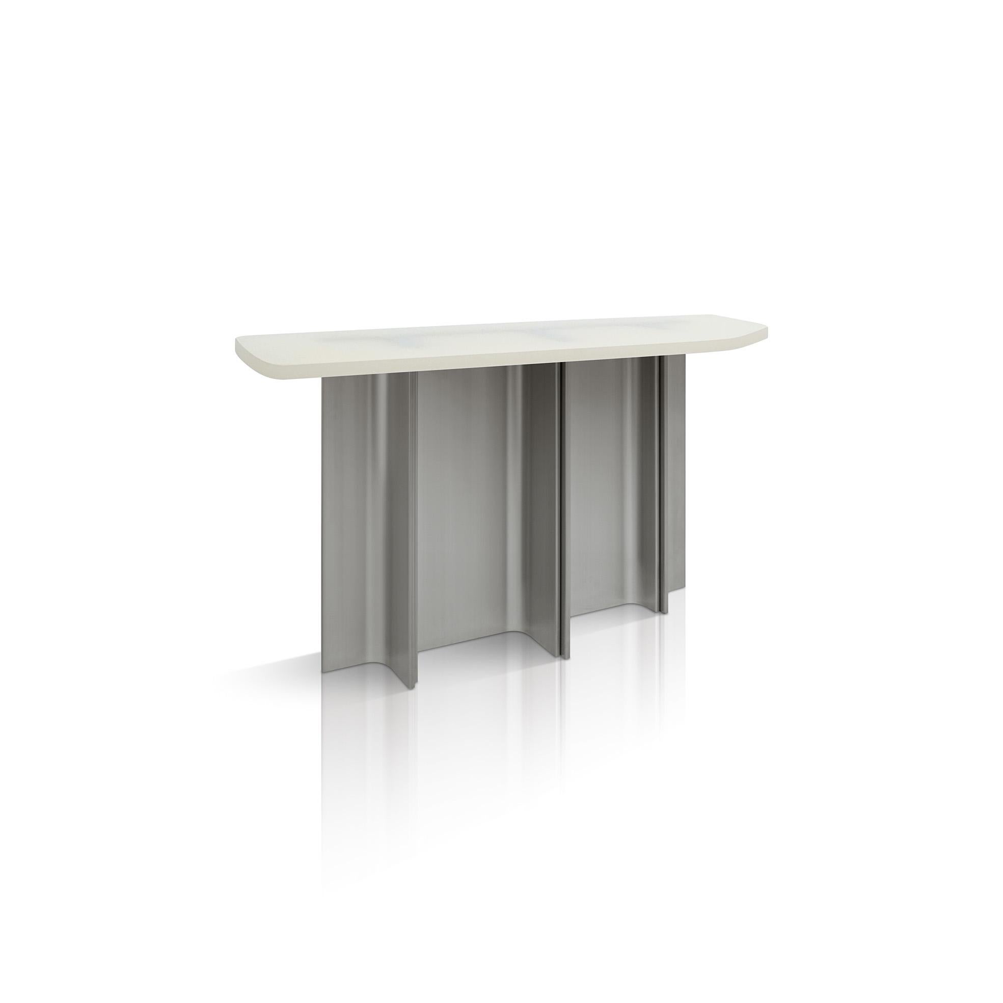 The Fossil Tables are inspired by an unusually combination of archaeology and Mies van der Rohe’s columns in the Barcelona Pavillion. As one lounges around the Fossil tables, the supporting structure is exposed through the translucent resin top -