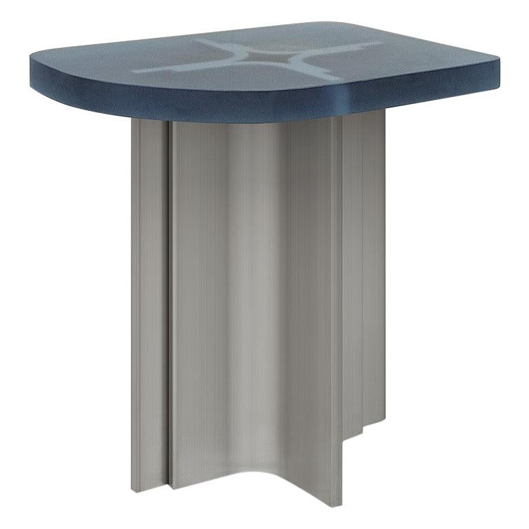 ‘Fossil’ side table in Brushed steel and aqua blue opaque resin
