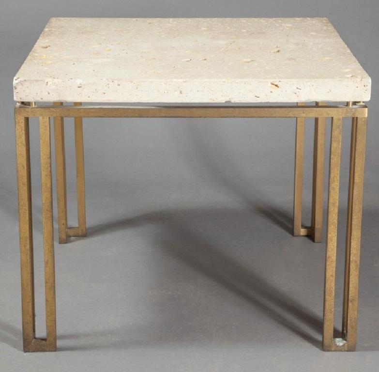 Fossilated limestone top and bronze table. The stone top has sea shell imprints with a polished bronze base. Stone top is approximately two inches thick. The table can also be used as a breakfast table and is big enough for four chairs.