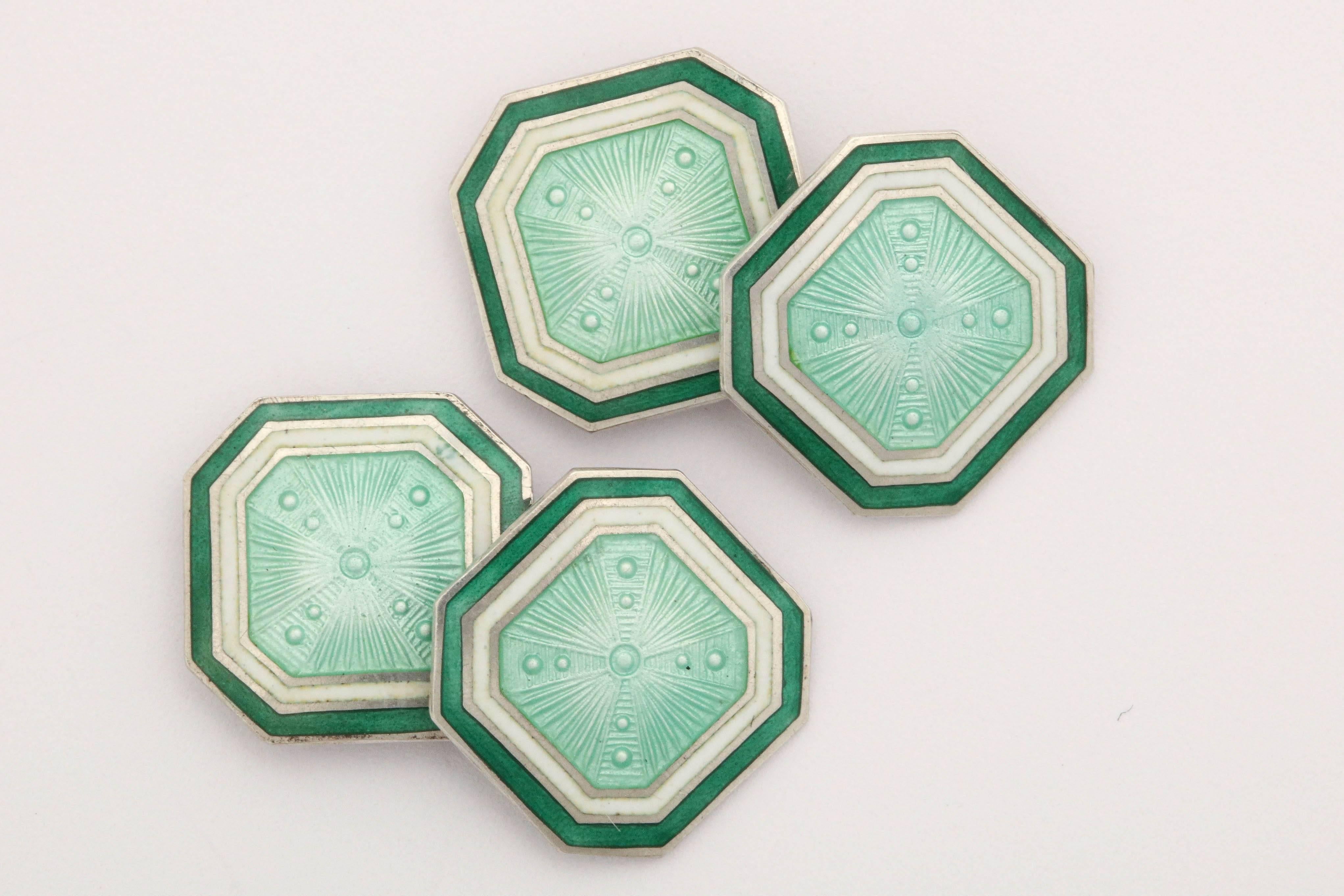 Octagonal with light green center surrounded by white border and dark green border. 
Impressed F & B / Sterling.