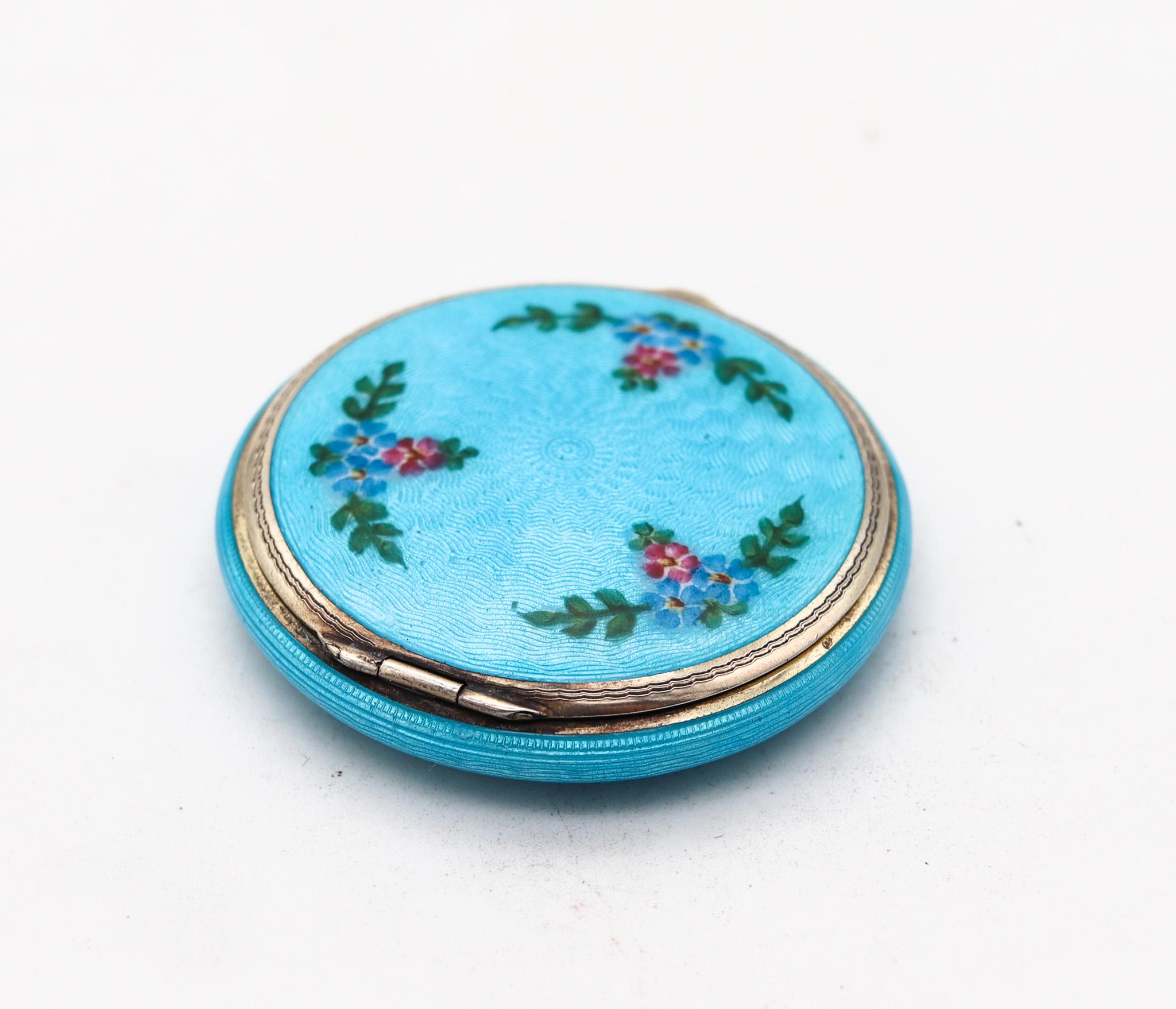 An art deco guilloche enamel box made by Foster & Bailey.

Beautiful enamel round box, created during the art deco period, back in the 1925. This beautiful antique piece was carefully crafted at the workshops of Foster & Bailey in solid .925/.999