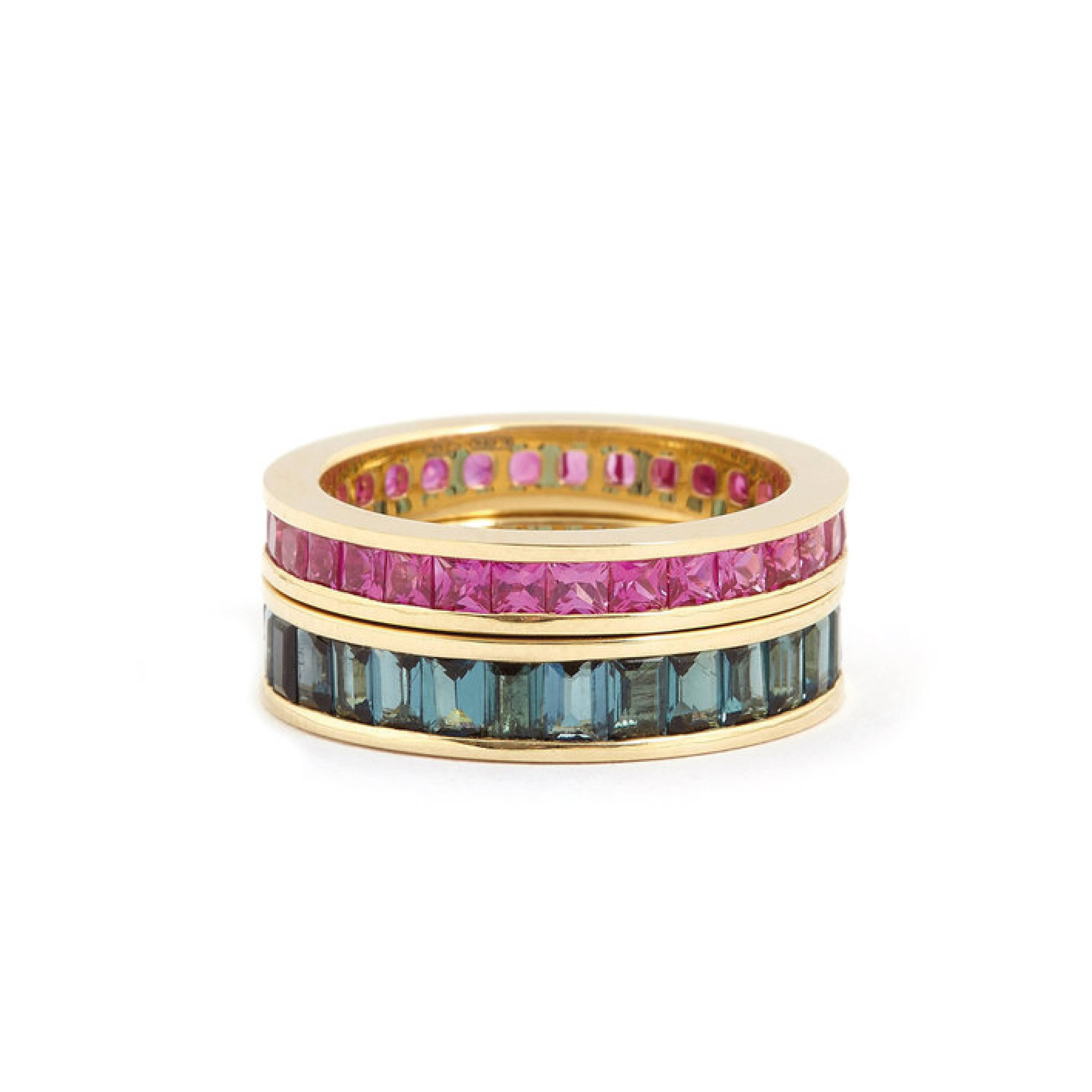 Eternity ring invisibly-set with a rare blue color tourmaline set in 18k yellow gold; channel set all the way around. Approx. weight is 3.2 carat. Crafted by master craftsmen in Italy.

Fouché bespoke band rings are created according to your band