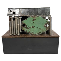 Found and Salvaged Steel House Structure on a Reclaimed Steel Plate, Wooden Base