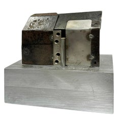 Found and Salvaged Steel Structure on a Wooden Base