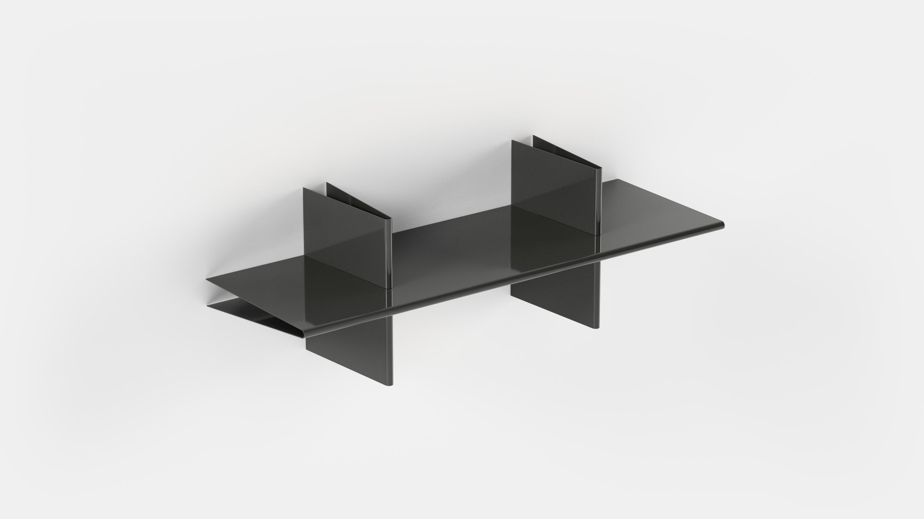 The CLIP shelf is made from powder-coated steel and is consisting of three folded metal plates that seamlessly interlock and effortlessly assembles into a sturdy storage solution. The carefully considered proportions allow for perfect alignment of
