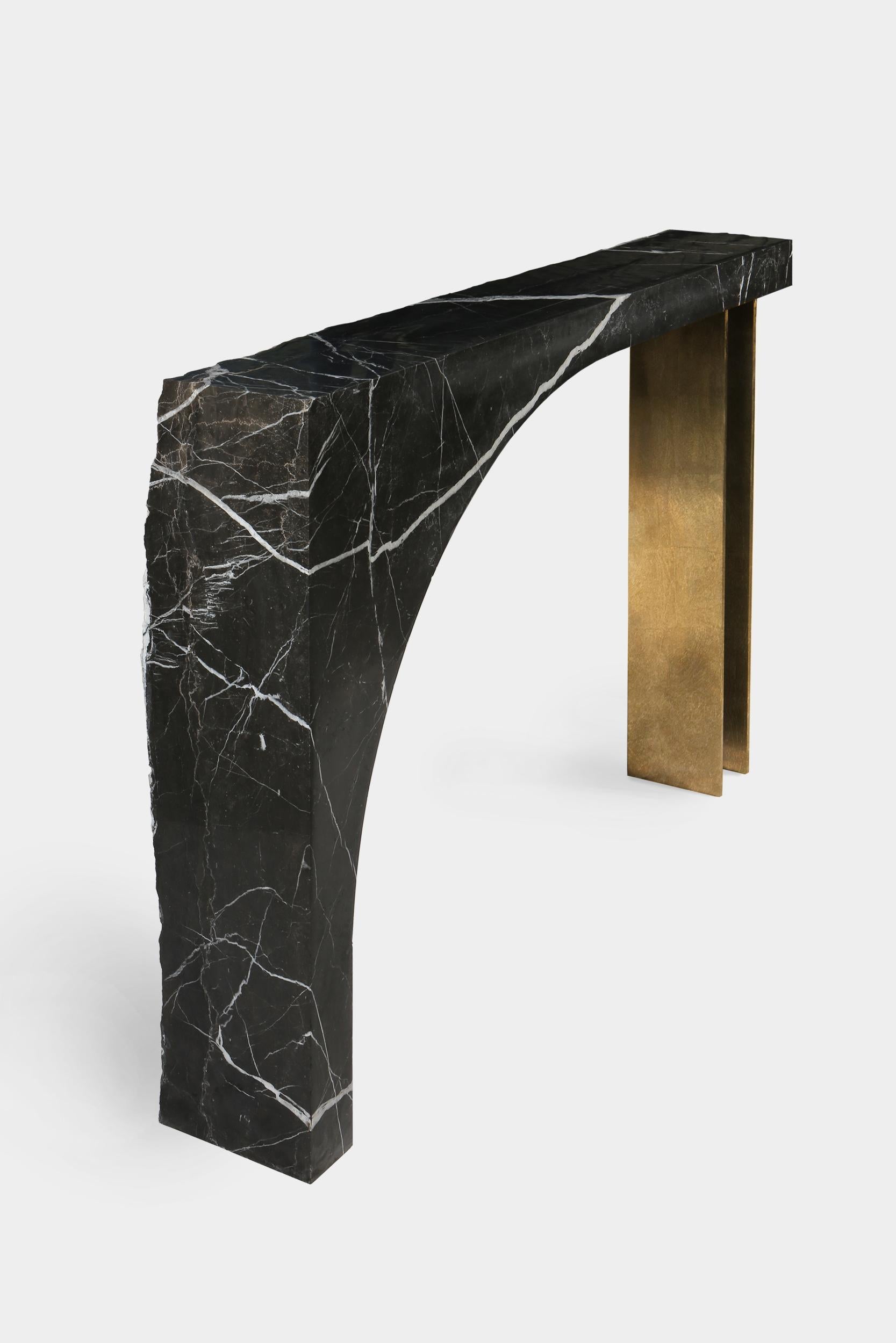 Found II console table No.2 by A Space
Dimensions: D100 xW 25 xH 84cm
Materials: Marble, steel, gold leaf.

Spontaneity, environmental awareness and the primeval nature of the materials are central themes explored in this collection, which