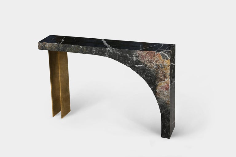 Spontaneity, environmental awareness and the primeval nature of the materials are central themes explored in this collection, which focuses on the power of the medium to dictate the final form these functional works of art take.

This console