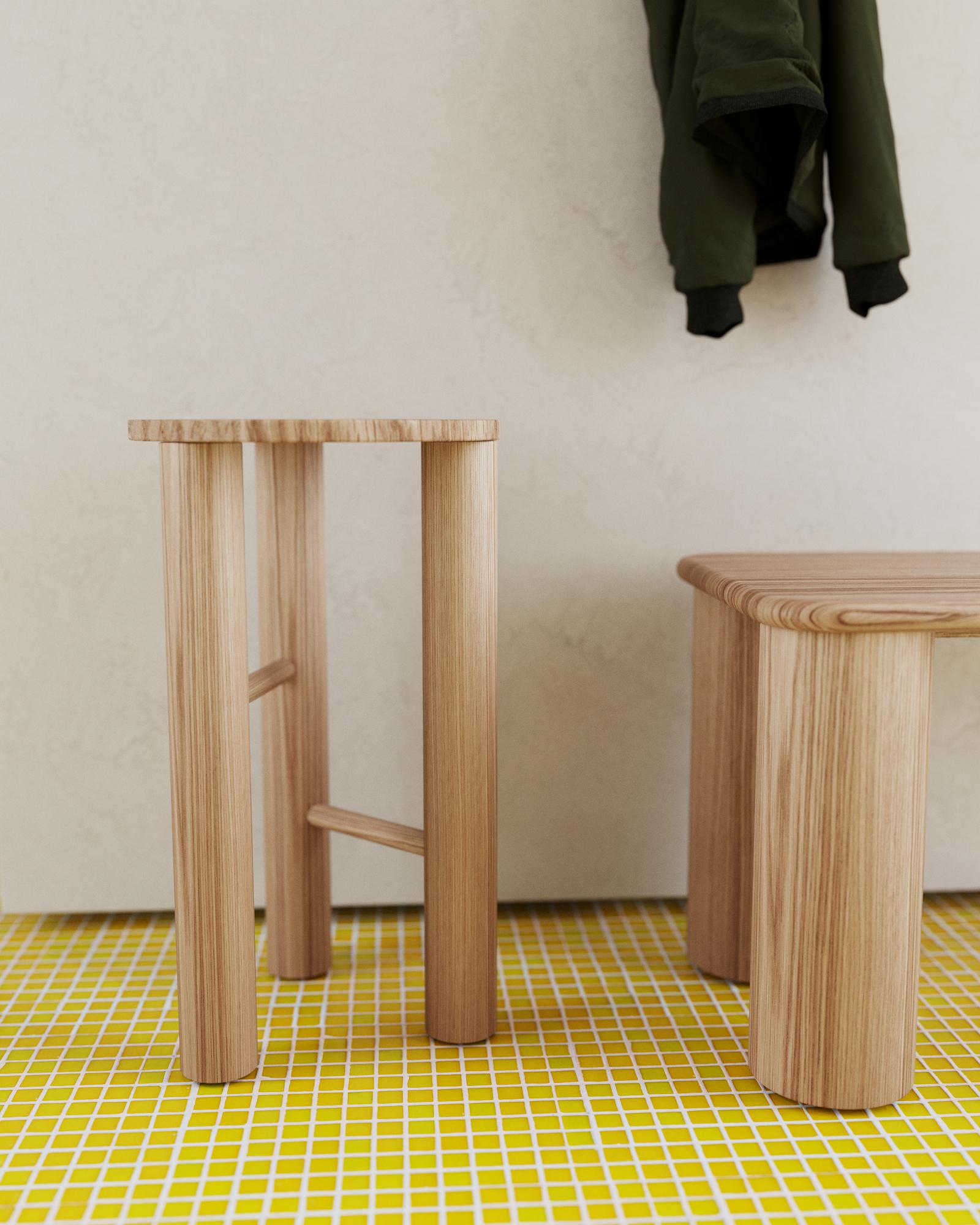 The LAD stool is crafted entirely from solid red oak covered with a clear matte lacquer. This unique stool captures the essence of local craftsmanship in Quebec. LAD is a versatile masterpiece with three legs, available in two heights - 2164 inches