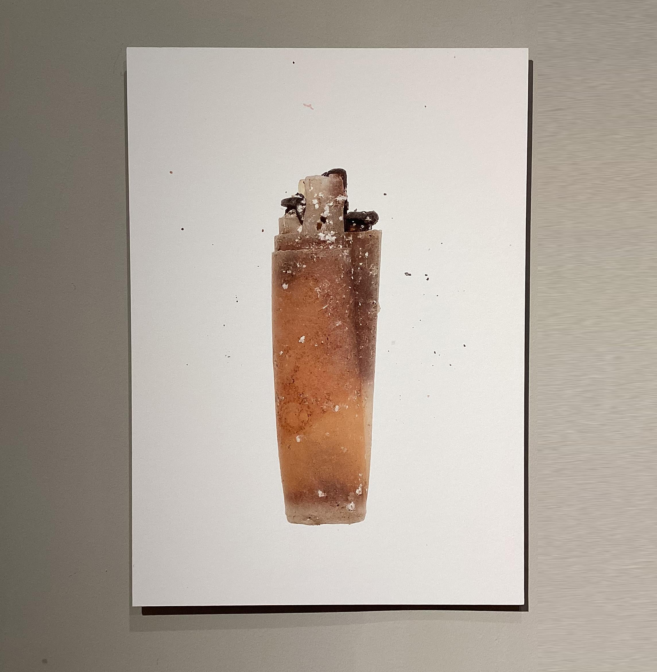 Found-object photograph: lighter recovered on the north coast of Menorca (Balearic Islands).

Original giclée printed on Hahnemühle FineArt Photo Rag 308 gsm — white, matte, acid-free, 100% cotton.

There are places that call to you—sites with a