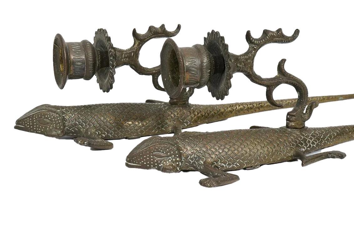 Illuminate your space with the unique allure of this found pair of etched brass lizard candle sconces, a testament to both artistic craftsmanship and the enchanting elegance of Mid Century style. Handmade with meticulous attention to detail, each
