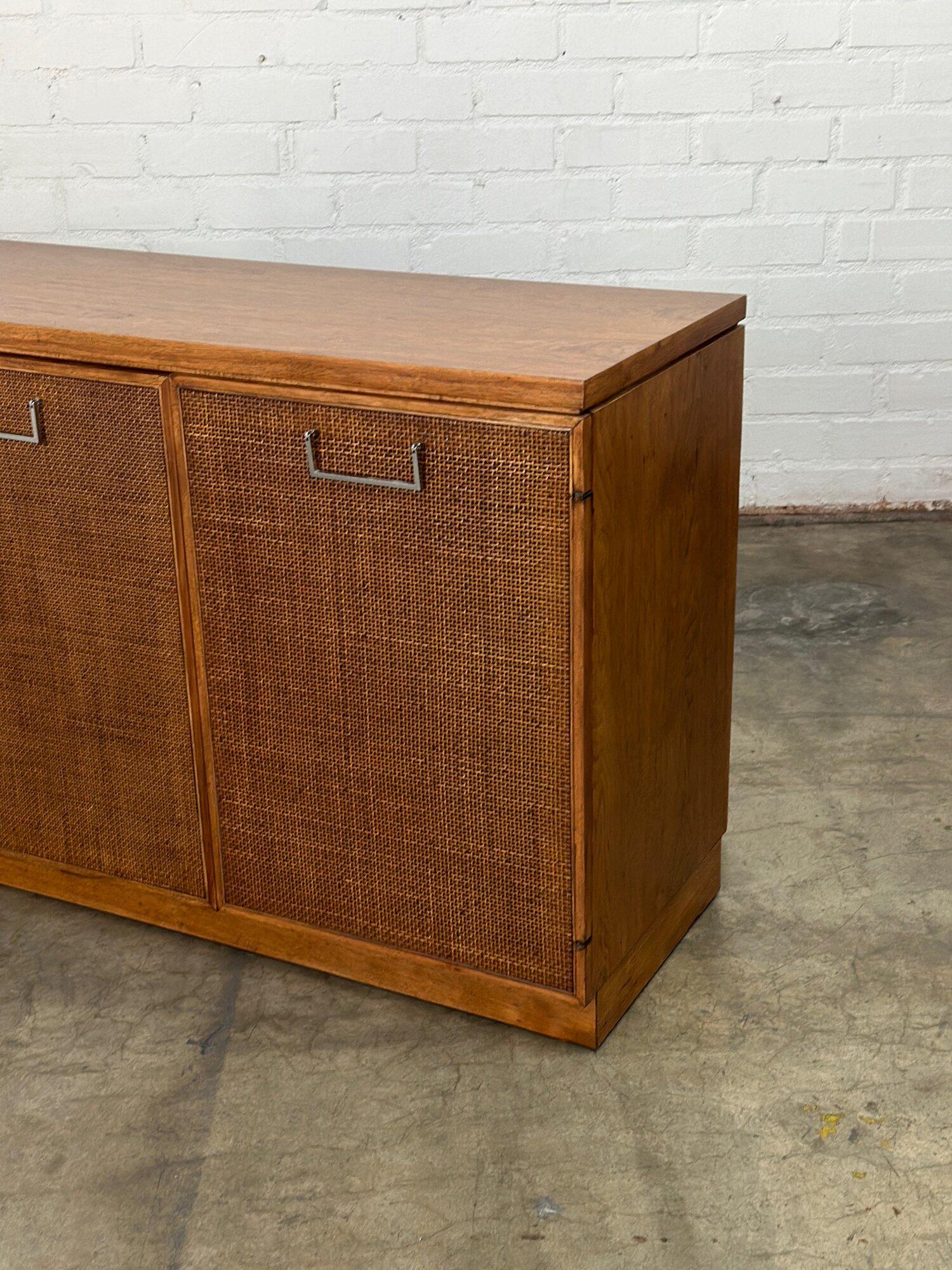 W78 D18 H31

Fully restored credenza in excellent condition by Founders Furniture Company a subsidiary of Knoll. Item is structurally sound and fully functional. Credenza features original cane in great shape with no visible breaks. Item has