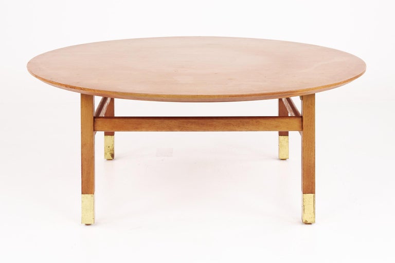 Founders furniture company mid century walnut and brass round coffee table

This table measures: 38 wide x 38 deep x 14.5 inches high

?All pieces of furniture can be had in what we call restored vintage condition. That means the piece is