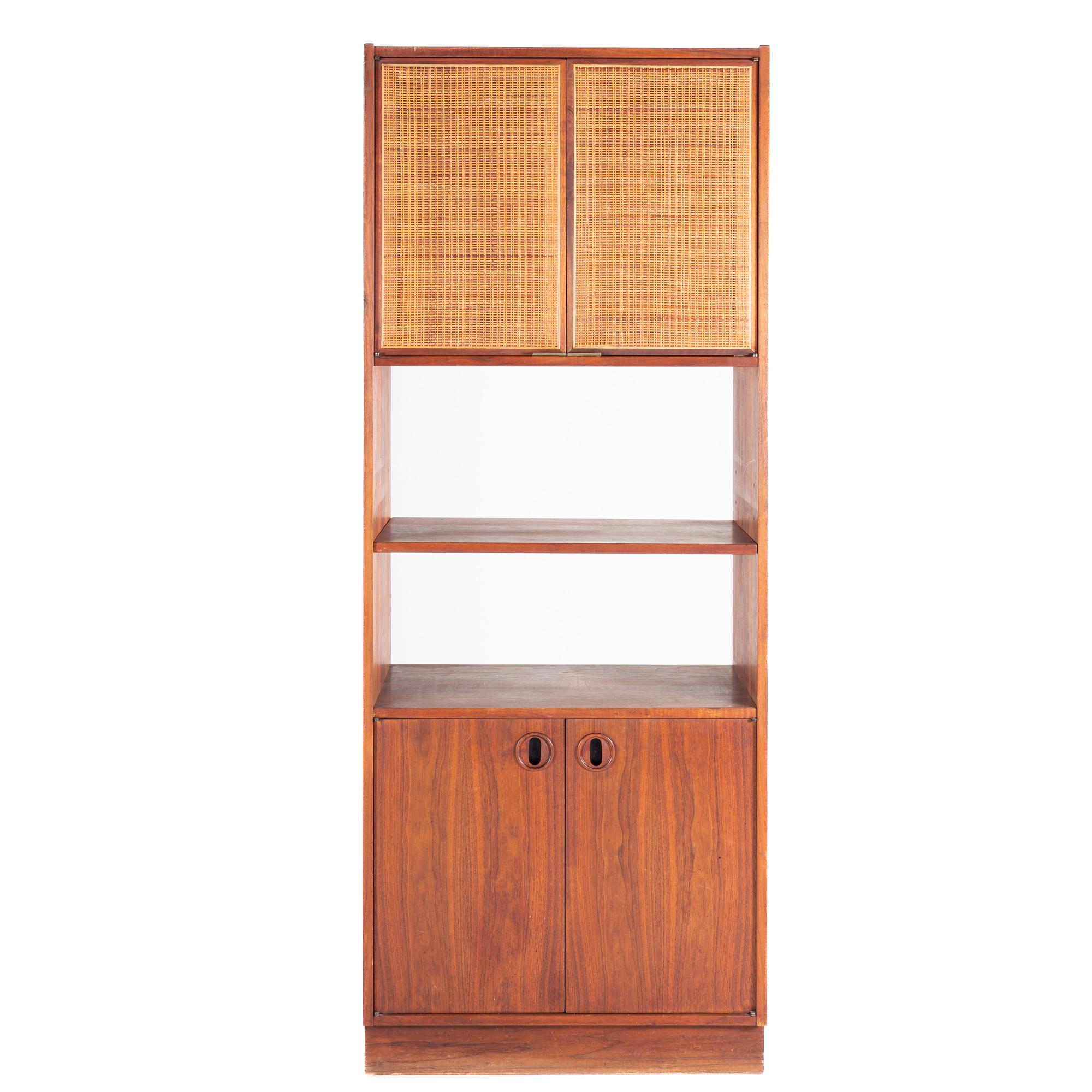 Founders style mid century walnut and cane display shelf

The shelf measures: 30.5 wide x 16.25 deep x 77.5 inches high

All pieces of furniture can be had in what we call restored vintage condition. That means the piece is restored upon