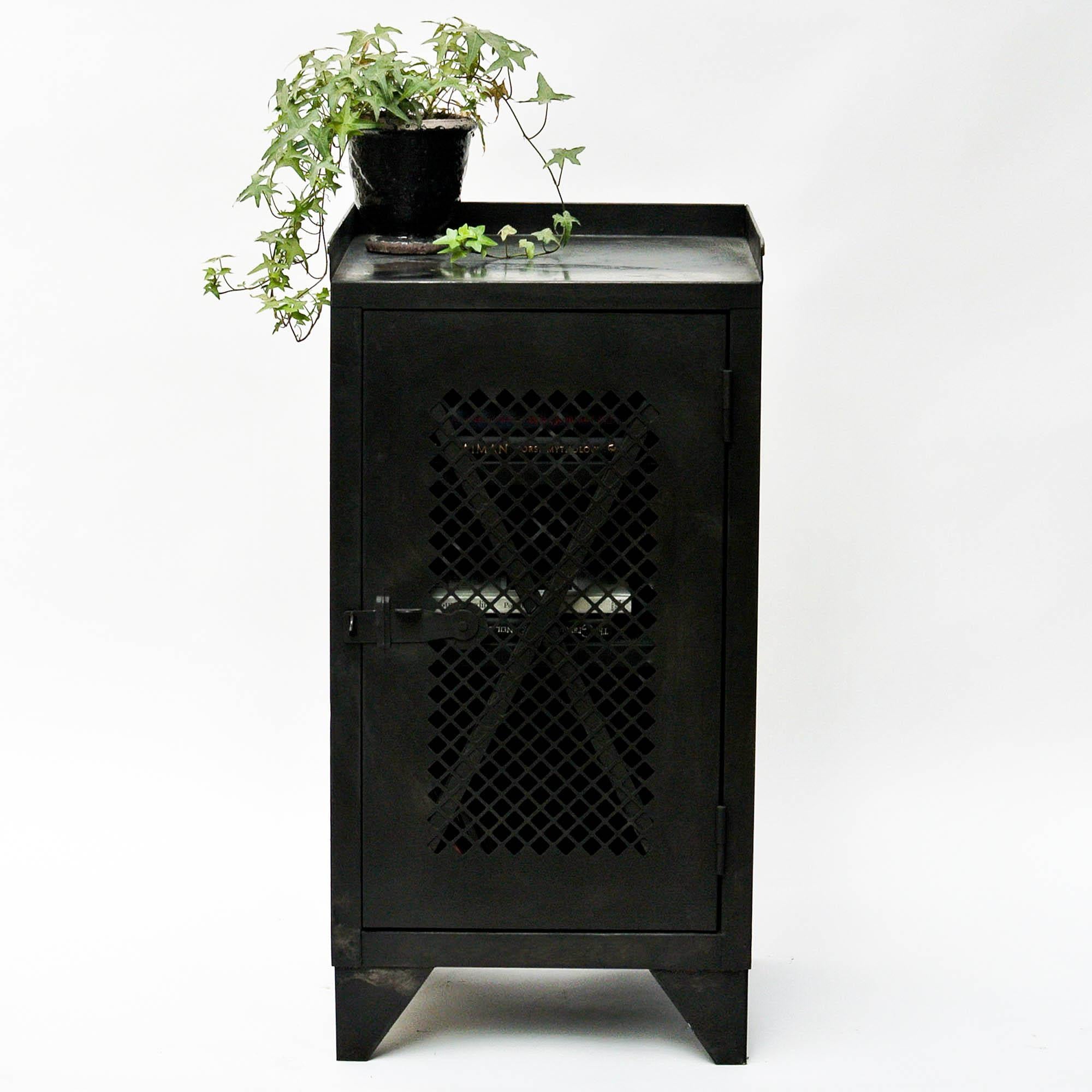 Old foundry’s cabinet, from the early 20th century. The perforated door is a design ethic carried out throughout the old manufacture. It has nice proportions. Pickled and patinated, elegant, offering a good storage capacity.