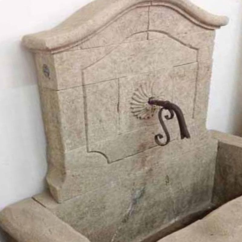 Here we have a carved limestone wall fountain from France with a rectangular base and a flower motif at the center of the wall.

Origin: France

Measurements: 4'6