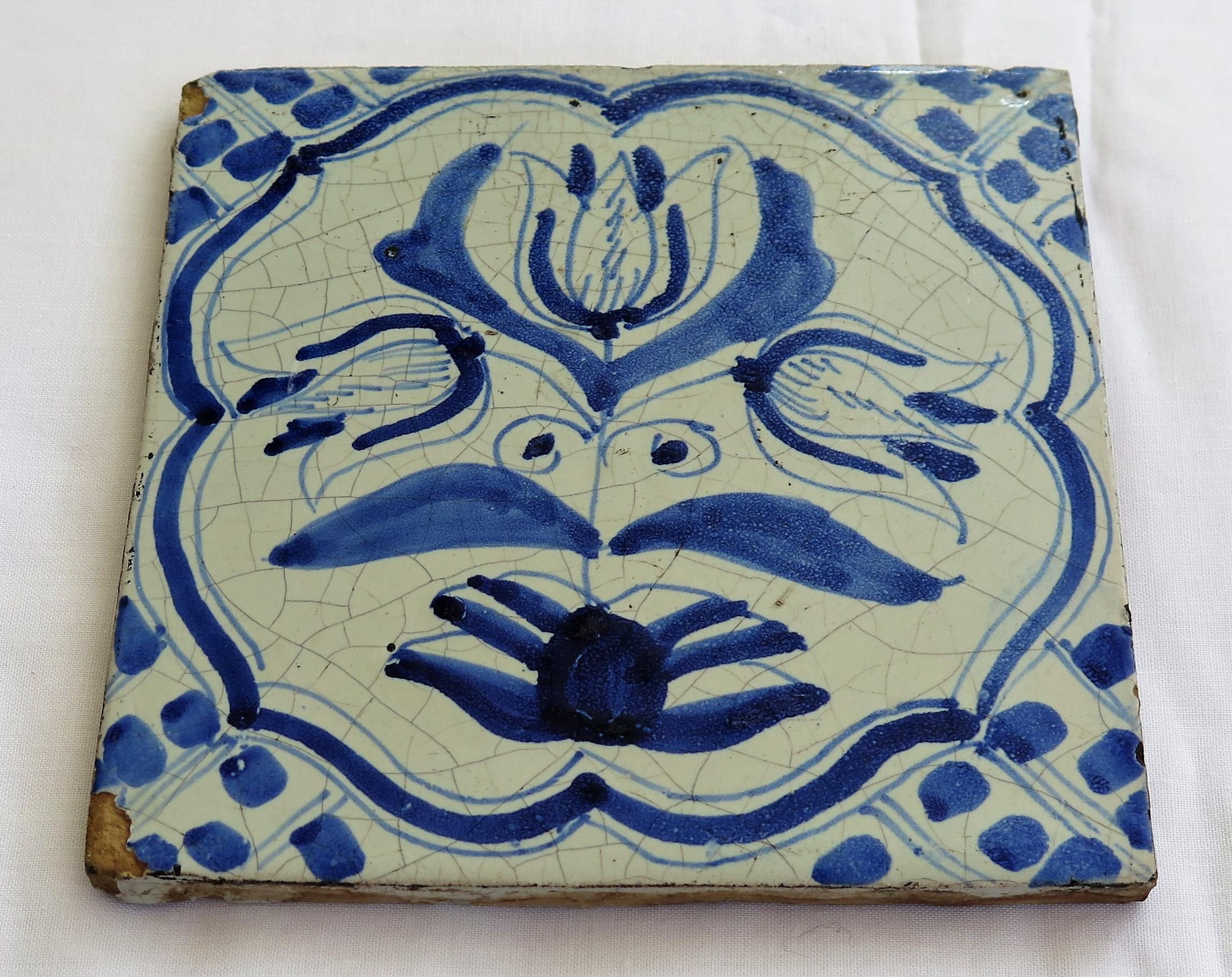 Four 17th Century Delft Ceramic Wall Tiles Blue and White Tulip Pattern, Dutch In Fair Condition In Lincoln, Lincolnshire