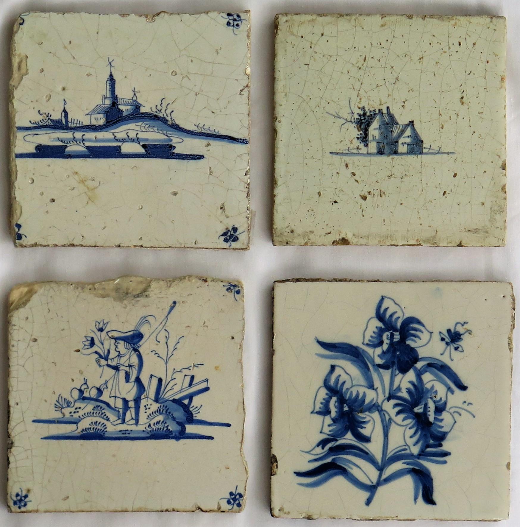 These are four very attractive individual and interesting, Dutch (Netherlands), delft blue and white hand painted ceramic wall tiles dating to the 17th century.

All tiles are nominally 5 inches square and 7/16 inches thick. 

Tile 1- Top left,