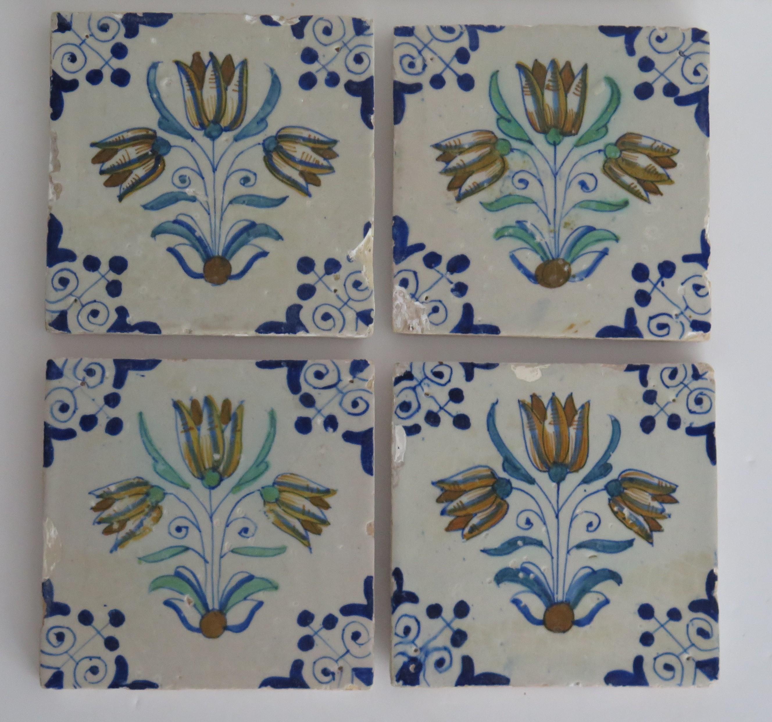 Four 17th Century Dutch Delft Ceramic Wall Tiles Polychrome Tulips, Circa 1640 In Fair Condition In Lincoln, Lincolnshire
