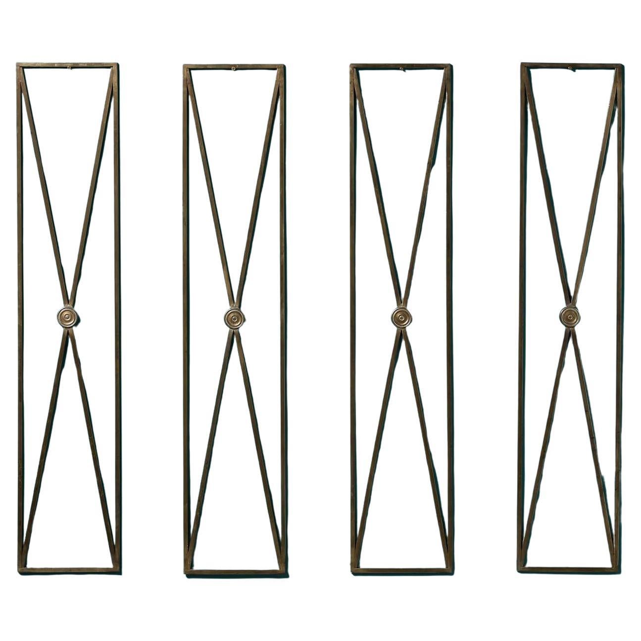 Cuatro paneles de pared Art Déco de bronce de los años 20
