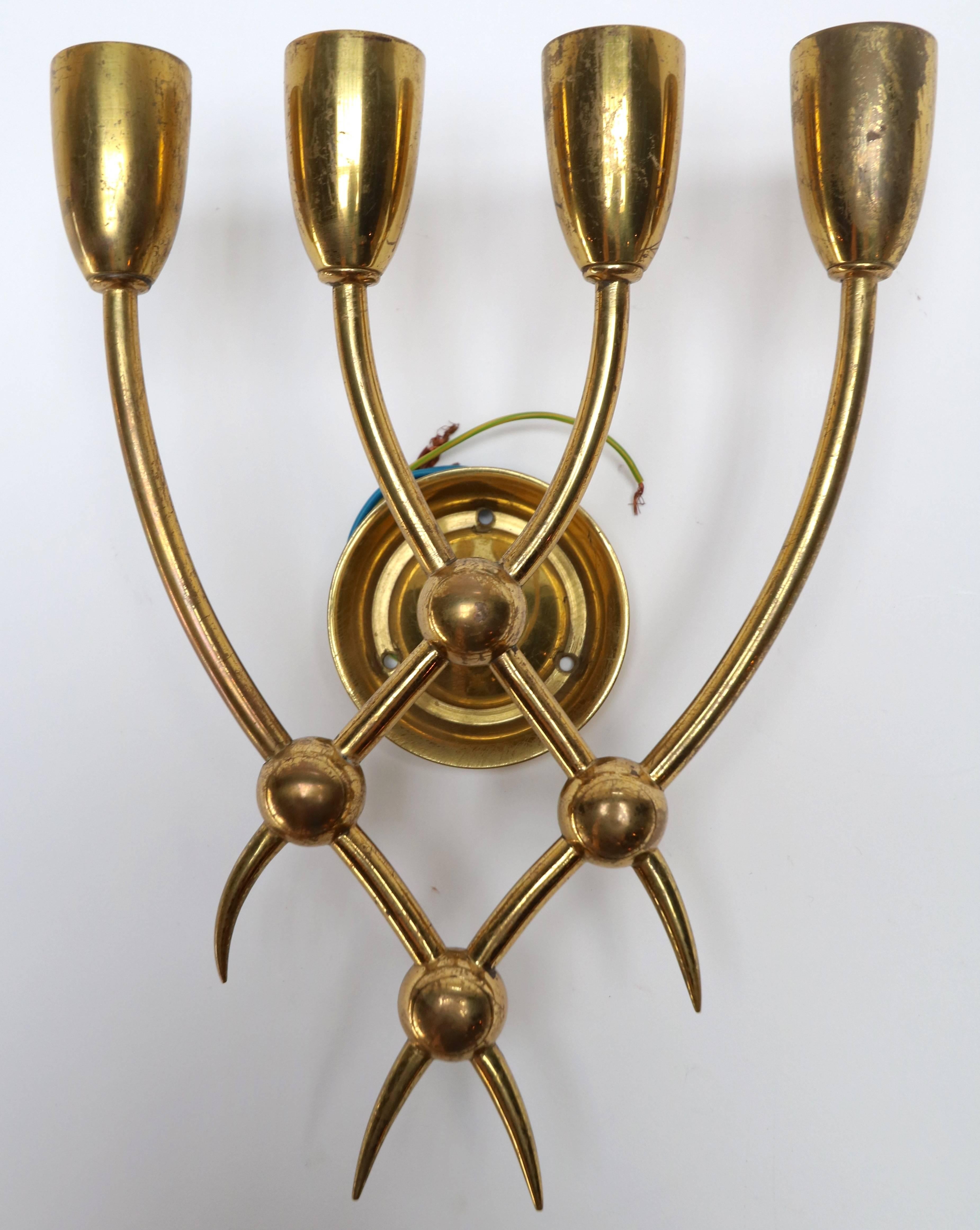 Four spectacular brass candelabra sconces by Guglielmo Ulrich from the 1940s.