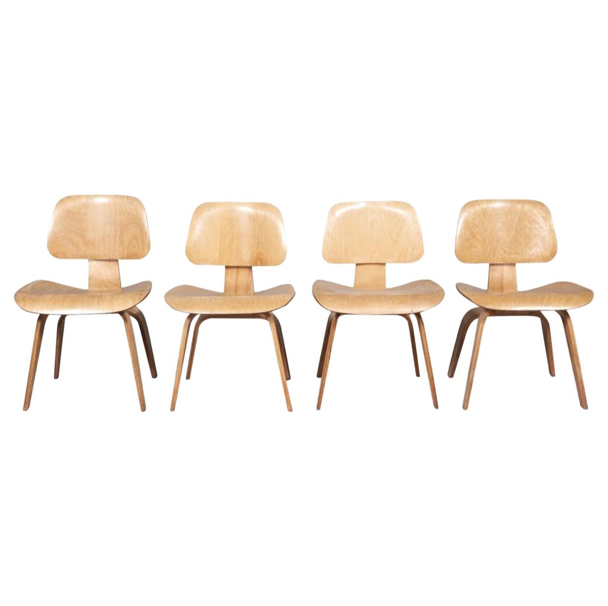 Four 1940s Early Eames DCW Dining Chairs by Evans Products