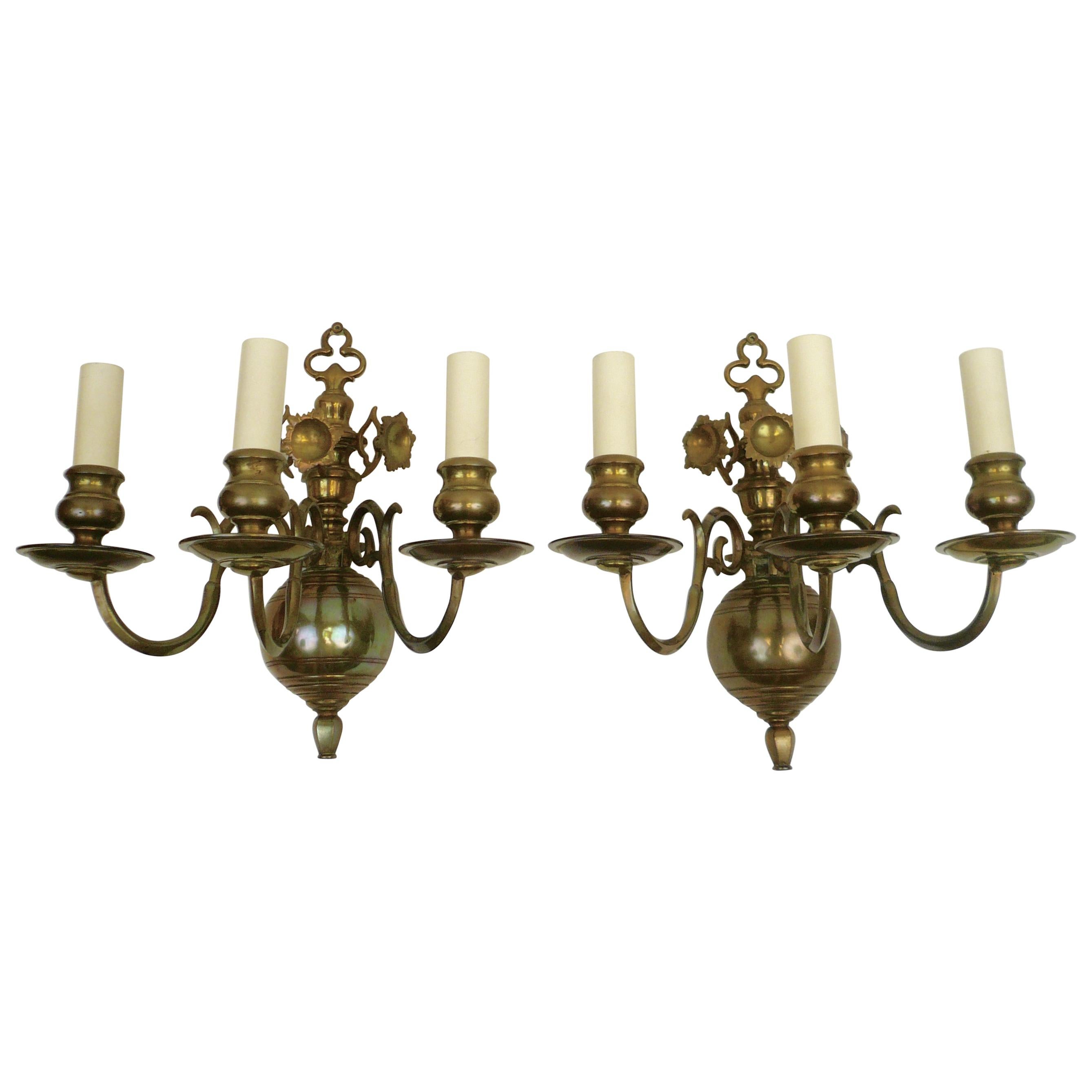 Four 19th Century Classic Dutch Baroque Style Brass Three-Light Sconces