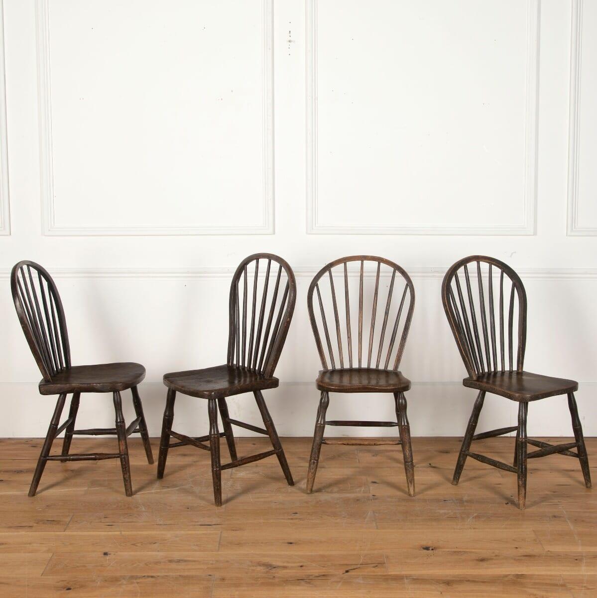 Matched set of four 19th century west country hoop and stick back chairs.

These primitive chairs represent centuries of traditional community craftsmanship.

Sturdy and practical, they will bring rustic charm to a contemporary interior.