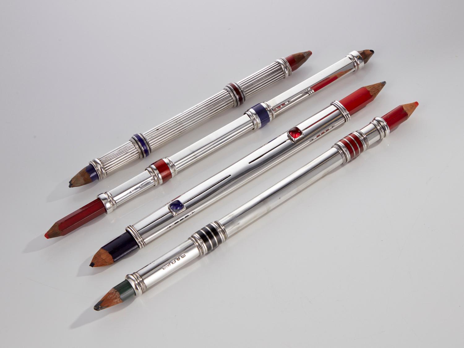 Four 20th century sterling `silver & Guilloche enamel draftsmen pencils with English and European Hall Marks Dates Circa 1910 - 1915.

I am selling these as a collection of draftsman's pencils. Each pencil has been beautifully designed in silver