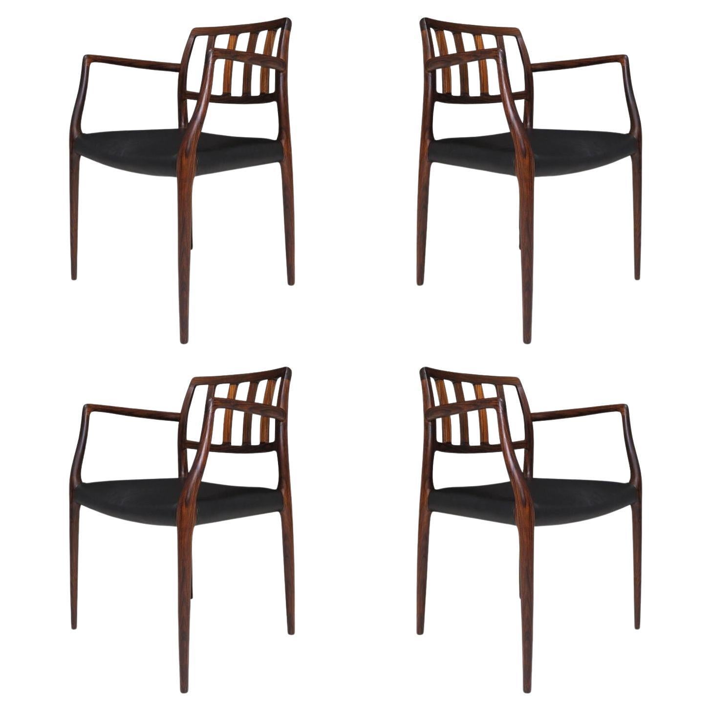 Four (4) Niels O. Moller Model 66 Rosewood and Leather Armchairs - Restored