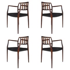Four (4) Niels O. Moller Model 66 Rosewood and Leather Armchairs - Restored
