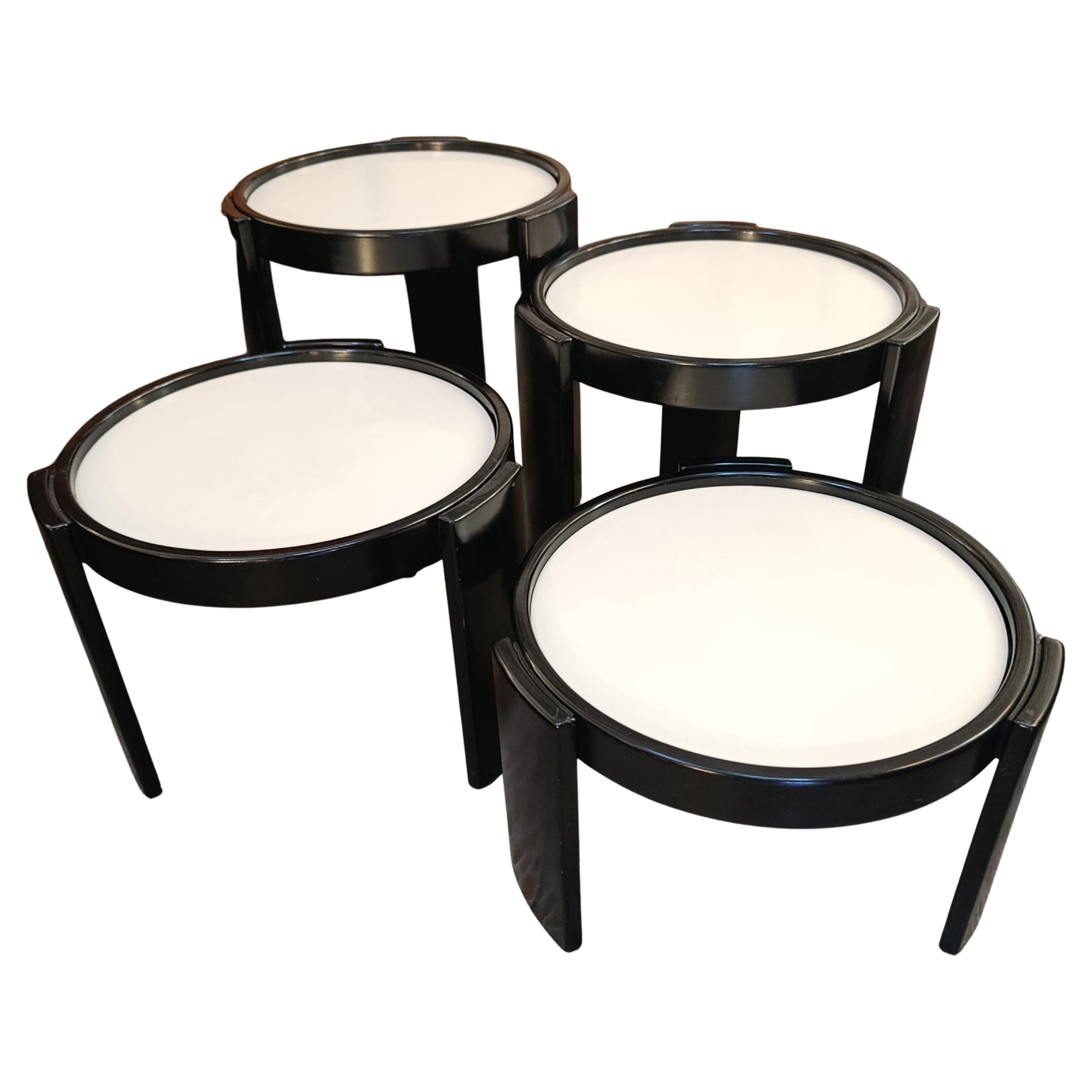 Four 780 nesting tables by Frattini for Cassina For Sale