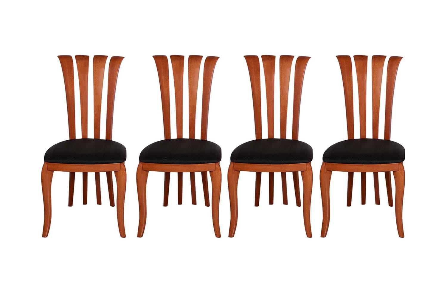 Spectacular set of four Italian curved -back dining side chairs by A. Sibau featuring sturdy, solid construction design. The four vertical ladder back curved slats continuing down to the floor, are elegant and pleasing to the eye, supported by