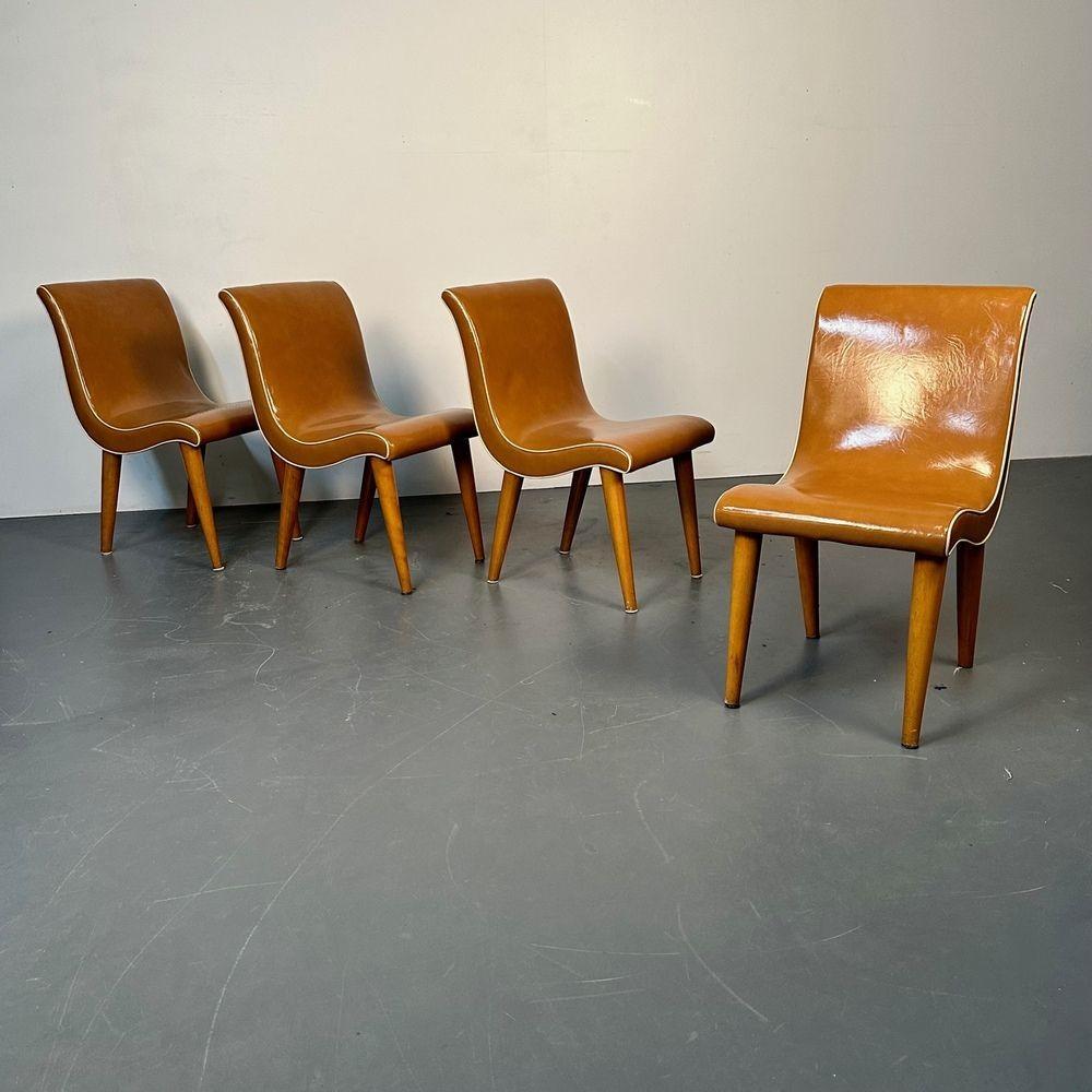 Four American Mid-Century Modern Curvy Dining / Side Chairs by Russel Wright
Russel Wright for Conant-Ball set of 4 curvaceous dining or side chairs. Each chair having four slightly curved blonde wood legs, a curvy leather seat and backrest. The