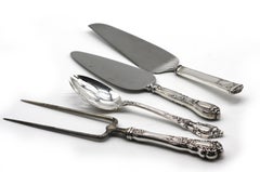 Quatre articles de service américains en argent sterling et inoxydable