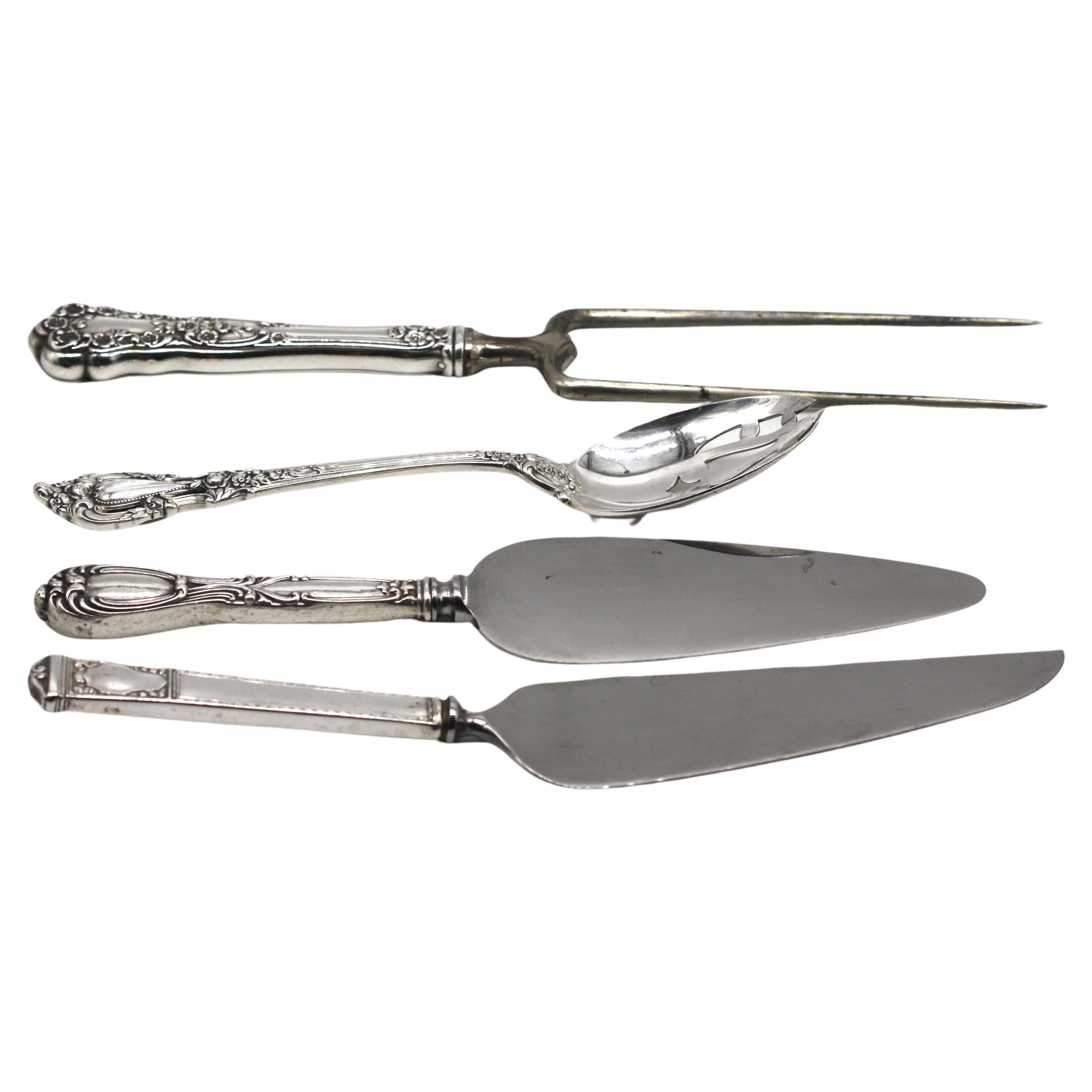 Quatre articles de service américains en argent sterling et inoxydable