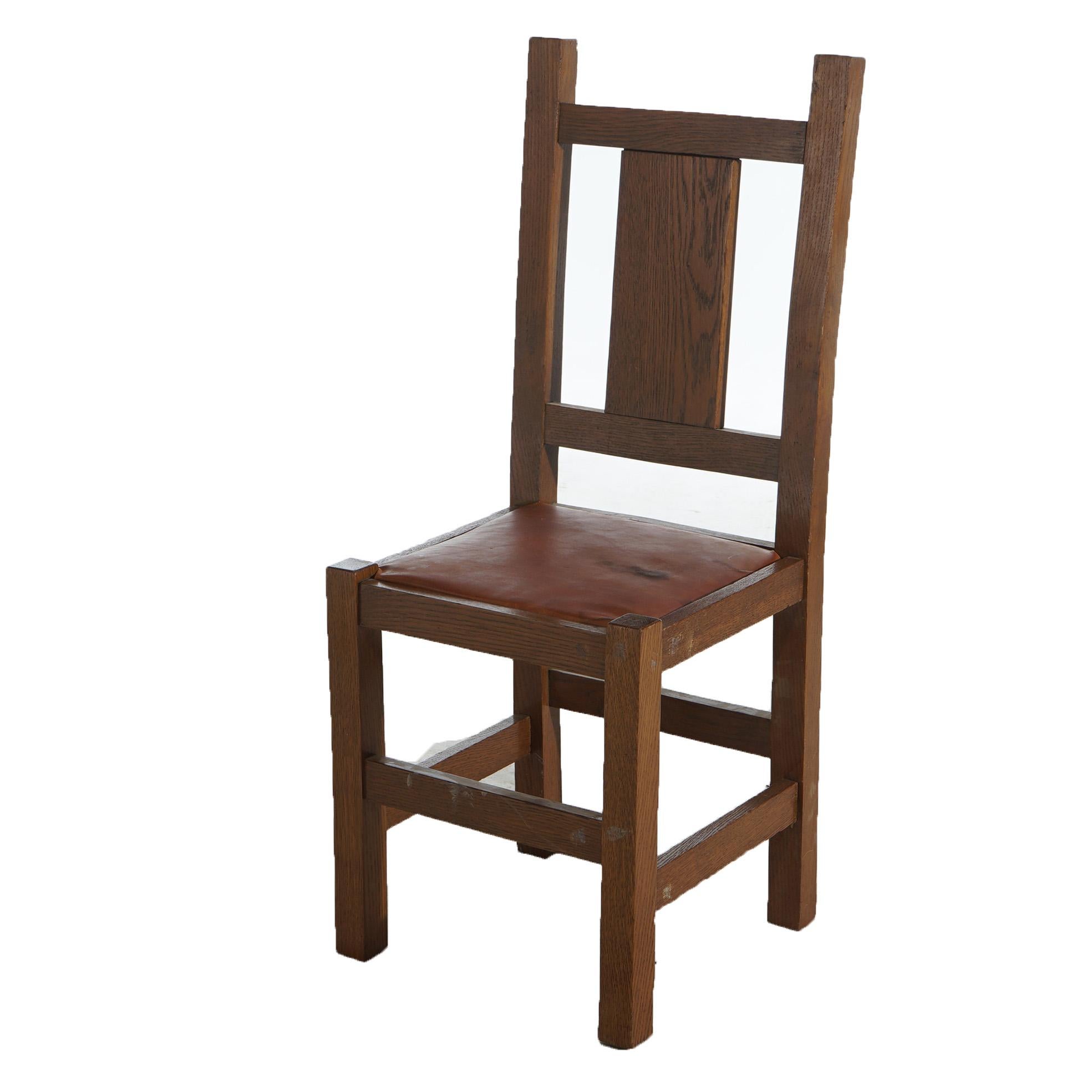 Set of Four Antique Arts & Crafts Roycroft School Mission Oak Dining Chairs with Slat Backs Circa 1910

Measures- 40''H x 18.75''W x 17.5''D; 18.5''SH