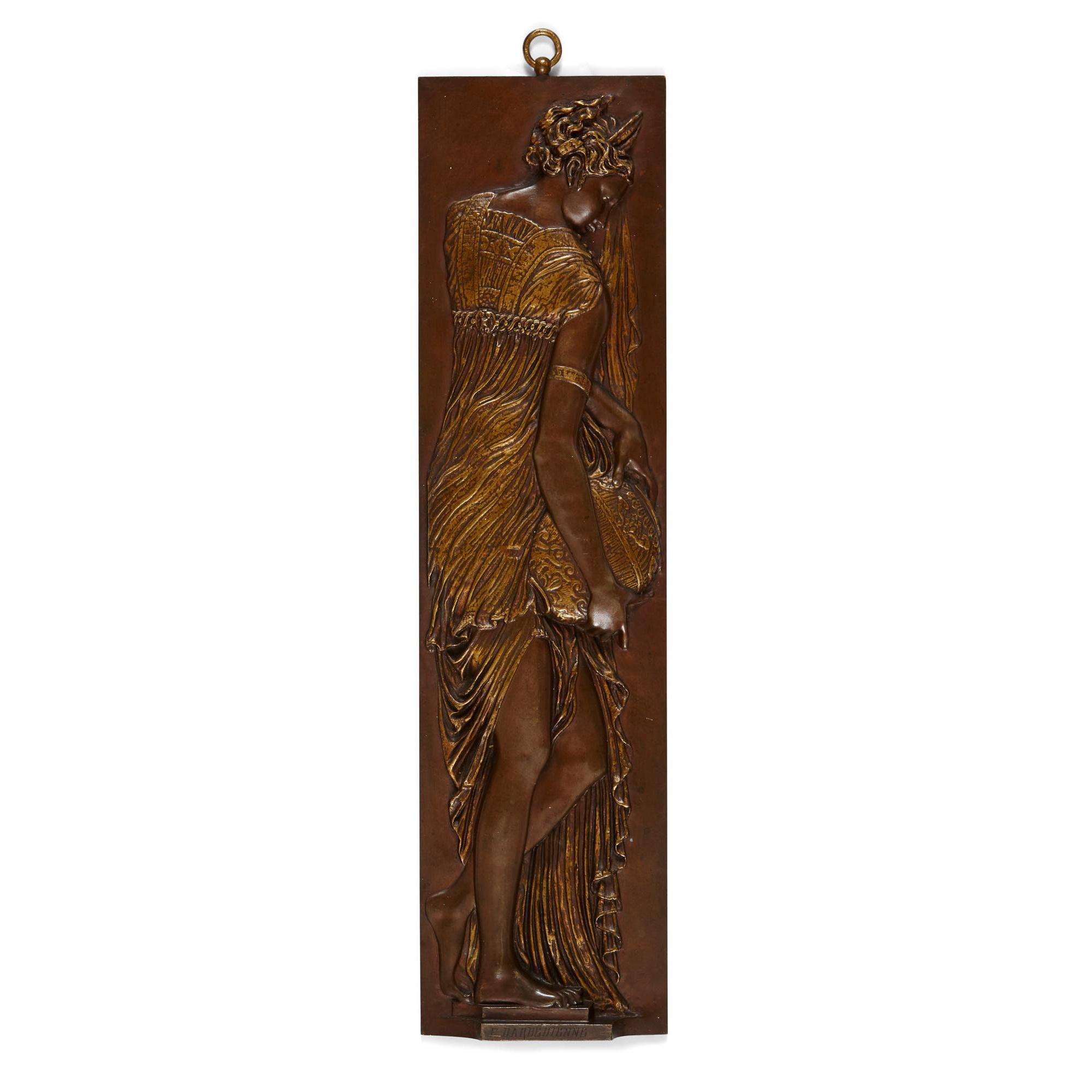 Four antique bronze plaques depicting water-nymphs, by Ferdinand Barbedienne
French, 19th century.
Measures: Height 47cm, width 12cm, depth 2.5cm

Finely cast in relief from patinated bronze with parcel gilt patina, these French 19th Century panels