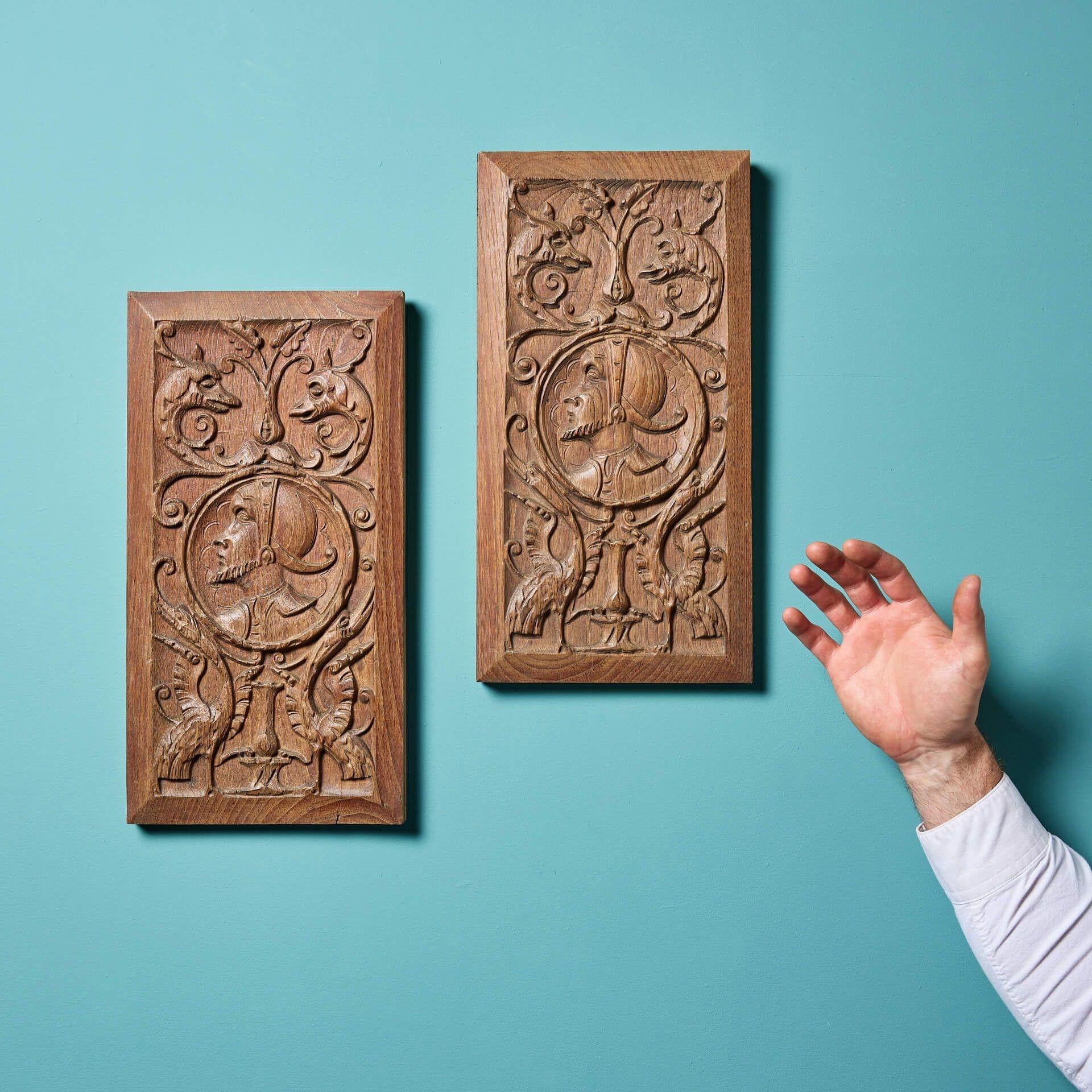 Two handsomely carved antique oak panels depicting mythical creatures and gentlemen in period costume.

Though these panels date from the early 20th century, they are evocative of earlier Tudor and Jacobean period designs and are very alike to