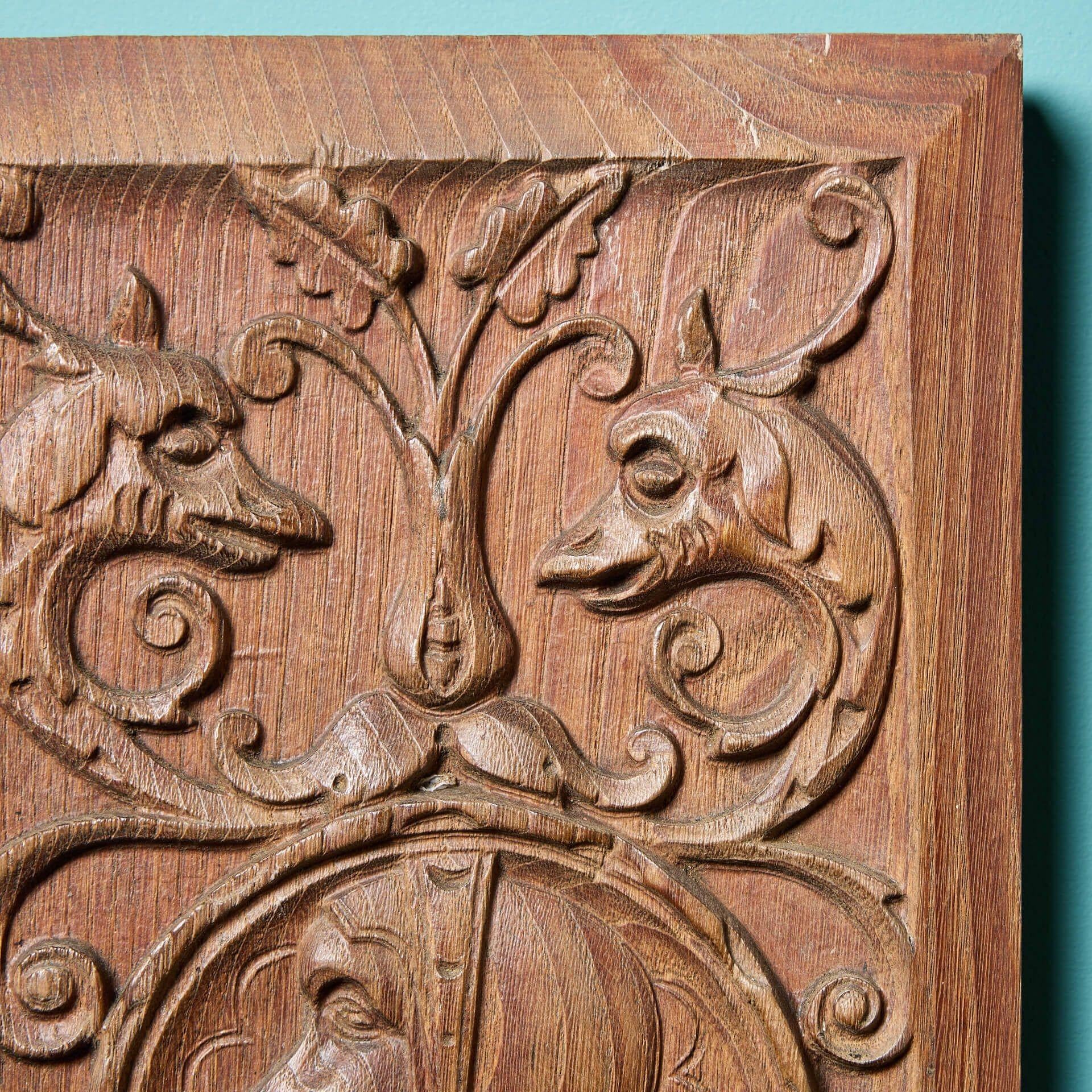 English Two Antique Carved Oak Panels with Mythical Creatures & Gentlemen in Costume For Sale