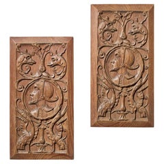Two Antique Carved Oak Panels with Mythical Creatures & Gentlemen in Costume