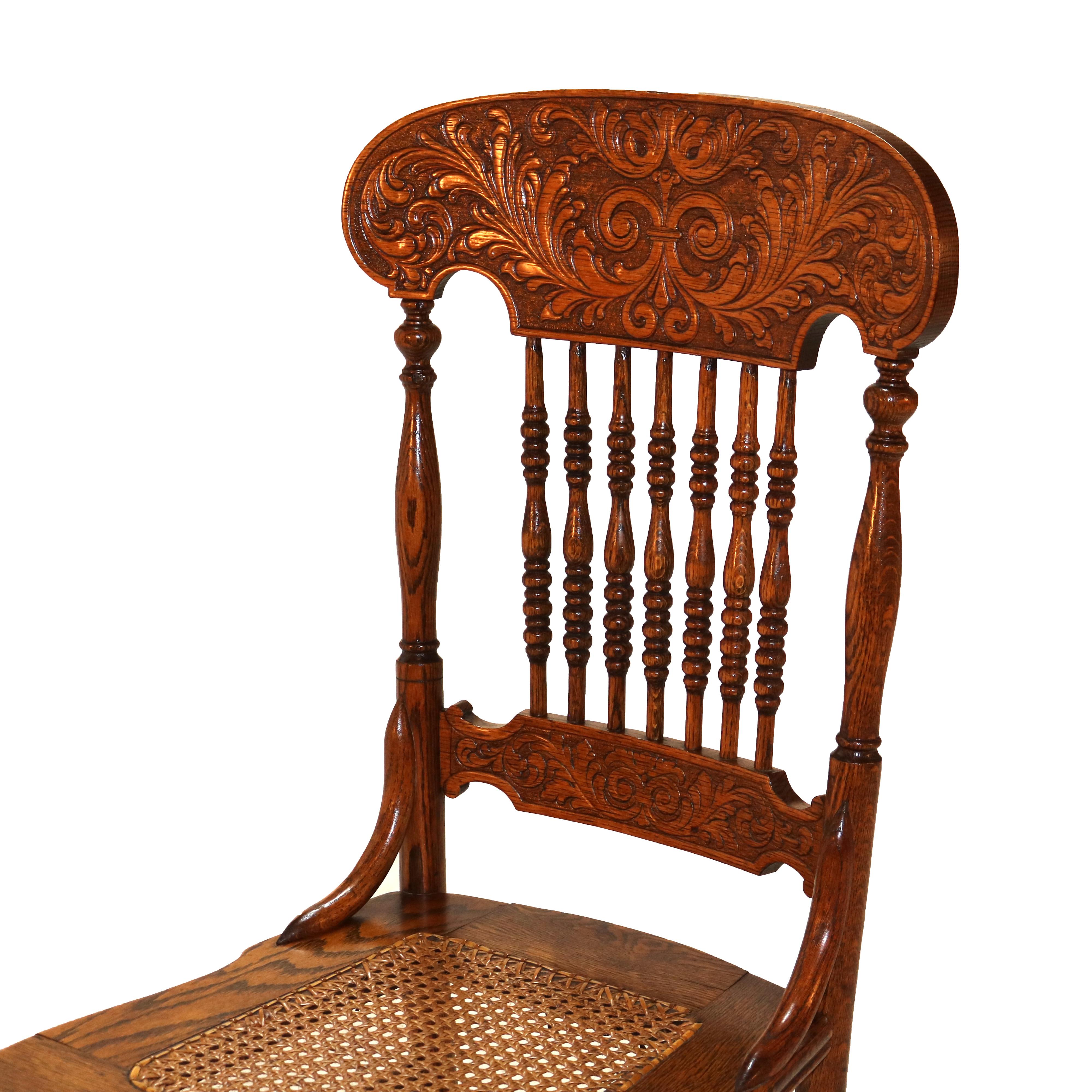 20th Century Four Antique Foliate Pressed & Spindle Back Oak Chairs with Caned Seats C1910