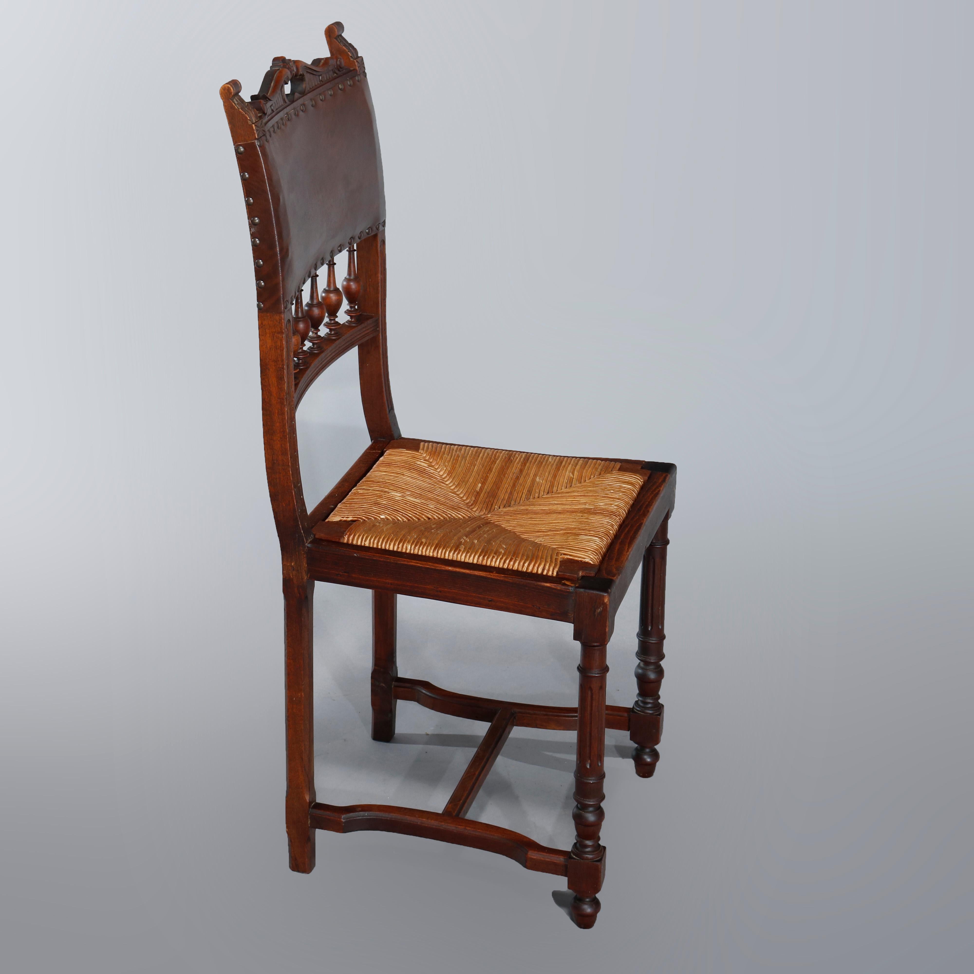 Rush Four Antique French Renaissance Carved Walnut and Leather Dining Chairs For Sale