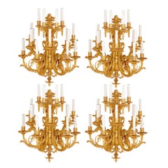 Four Antique Gilt Bronze Fifteen-Light Wall Sconces