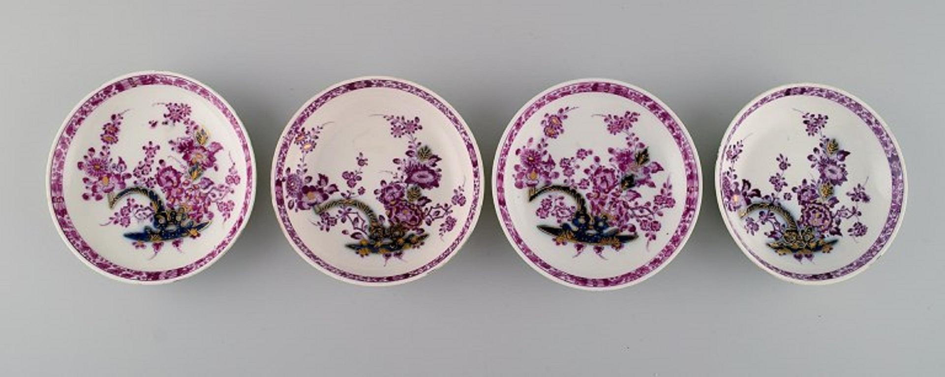Four antique Meissen teacups with saucers in hand-painted porcelain. 
Purple flowers and gold decoration. 
Museum quality, approx. 1740.
The cup measures: 7.5 x 4.2 cm.
Saucer measures: 12.2 x 2.5 cm.
In excellent condition.
Stamped.
1st