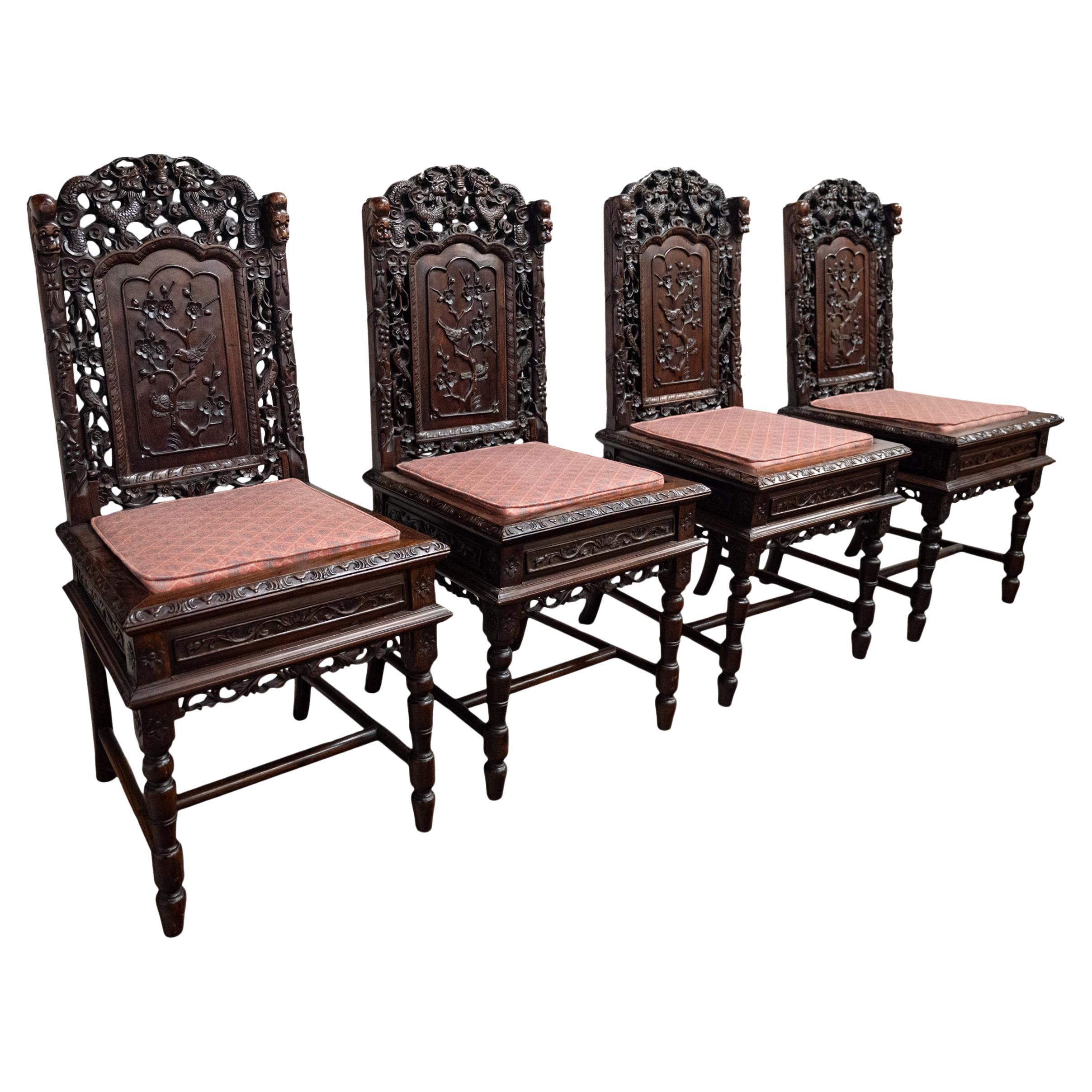 Vier antike Qing Dynasty Chinese Carved Rosewood Side Dining Dragon Chairs 1880