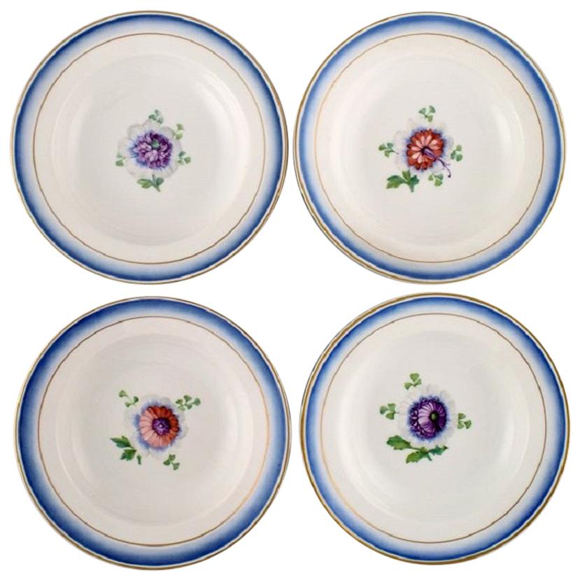 Four Antique Royal Copenhagen Deep Plates in Hand Painted Porcelain