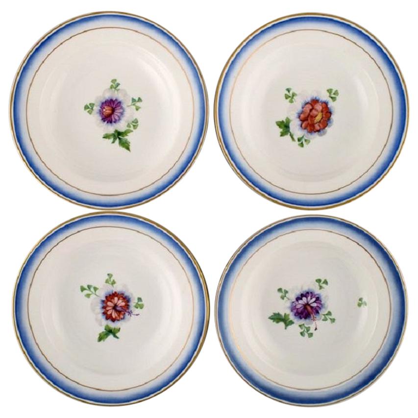 Four Antique Royal Copenhagen Deep Plates in Hand Painted Porcelain For Sale