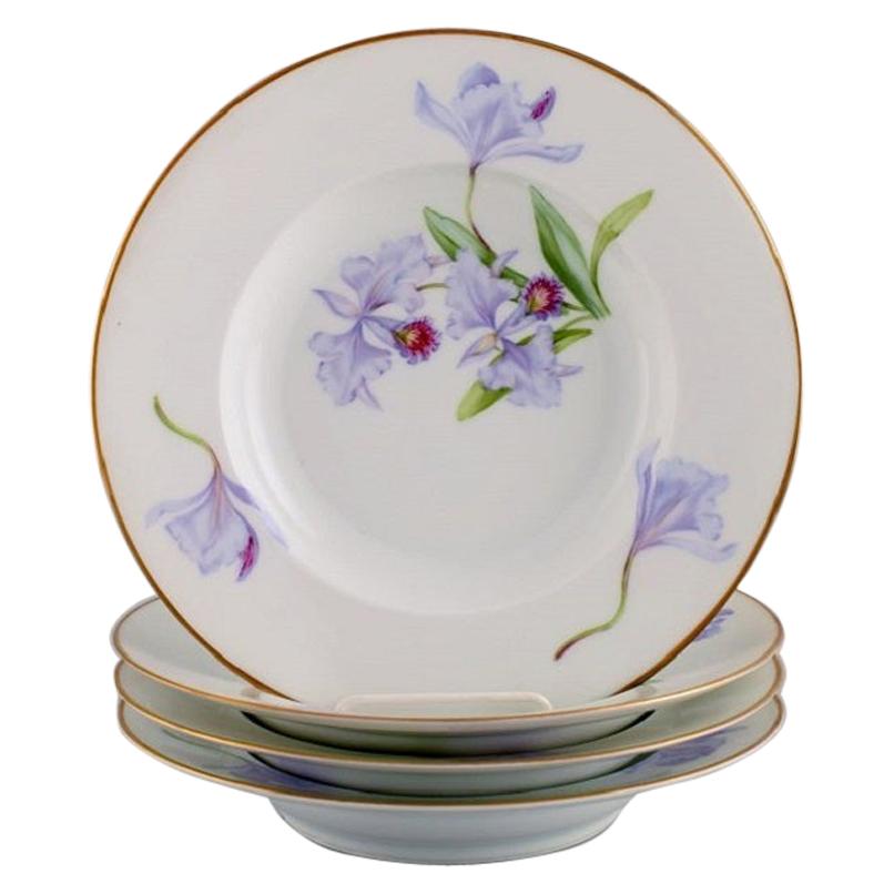 Four Antique Royal Copenhagen Deep Plates in Porcelain with Hand-Painted Flowers