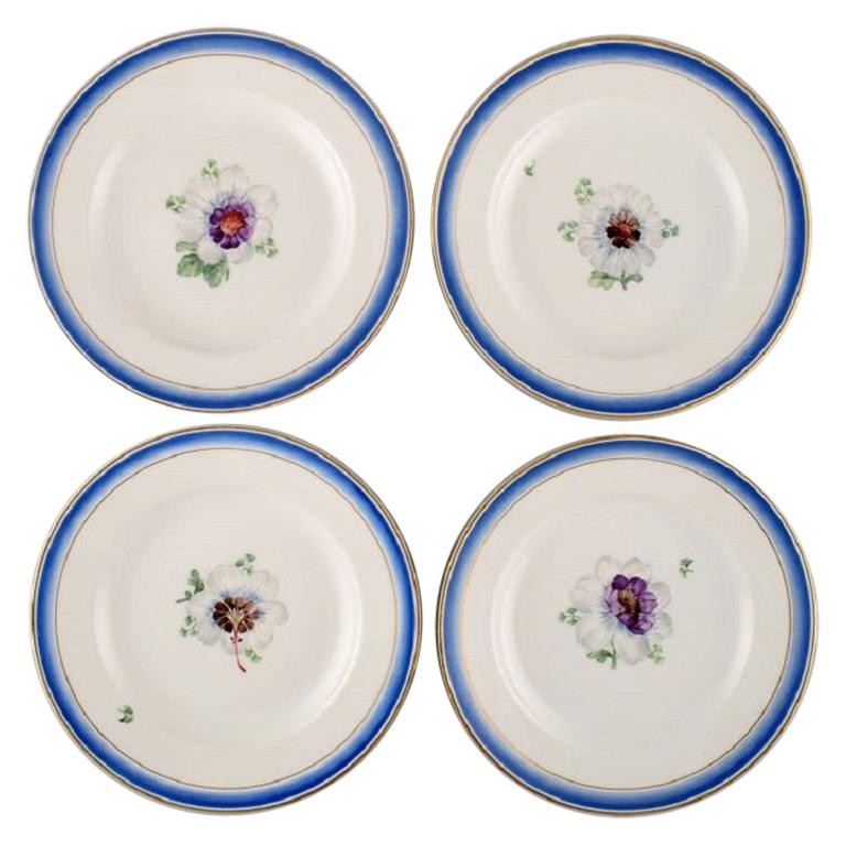 Four Antique Royal Copenhagen Plates in Hand Painted Porcelain with Flowers