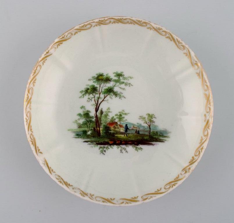 Hand-Painted Four antique Royal Copenhagen porcelain bowls with hand-painted landscapes. For Sale